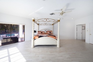 Welcome to this exceptional one-story estate in the highly on Boca West Golf and Country Club in Florida - for sale on GolfHomes.com, golf home, golf lot