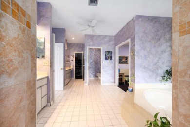 Welcome to this exceptional one-story estate in the highly on Boca West Golf and Country Club in Florida - for sale on GolfHomes.com, golf home, golf lot