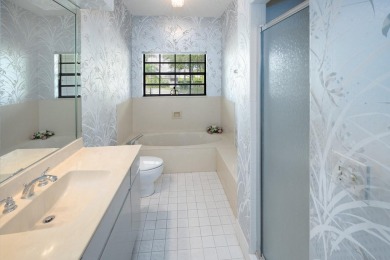 Welcome to this exceptional one-story estate in the highly on Boca West Golf and Country Club in Florida - for sale on GolfHomes.com, golf home, golf lot