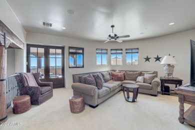 This high-quality custom home with sunset views in guard-gated on Mirabel Golf Club in Arizona - for sale on GolfHomes.com, golf home, golf lot