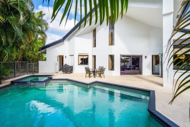 Welcome to this exceptional one-story estate in the highly on Boca West Golf and Country Club in Florida - for sale on GolfHomes.com, golf home, golf lot