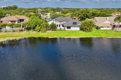 Welcome to this exceptional one-story estate in the highly on Boca West Golf and Country Club in Florida - for sale on GolfHomes.com, golf home, golf lot