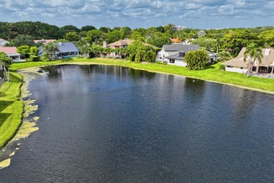 Welcome to this exceptional one-story estate in the highly on Boca West Golf and Country Club in Florida - for sale on GolfHomes.com, golf home, golf lot