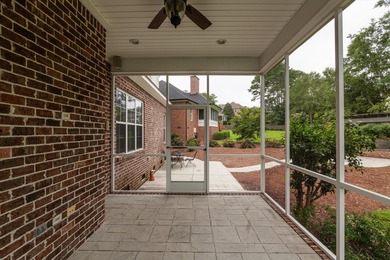 Welcome to this stunning 5-bedroom, 3-bathroom custom-built home on Bartram Trail Golf Club in Georgia - for sale on GolfHomes.com, golf home, golf lot