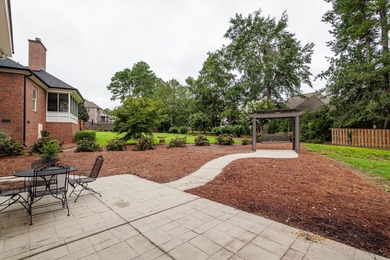Welcome to this stunning 5-bedroom, 3-bathroom custom-built home on Bartram Trail Golf Club in Georgia - for sale on GolfHomes.com, golf home, golf lot