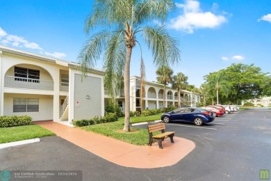 Resort-style living can be yours in the beautiful community of on Wynmoor Golf Course in Florida - for sale on GolfHomes.com, golf home, golf lot