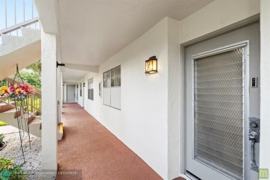 Resort-style living can be yours in the beautiful community of on Wynmoor Golf Course in Florida - for sale on GolfHomes.com, golf home, golf lot