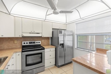 Resort-style living can be yours in the beautiful community of on Wynmoor Golf Course in Florida - for sale on GolfHomes.com, golf home, golf lot