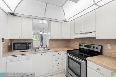 Resort-style living can be yours in the beautiful community of on Wynmoor Golf Course in Florida - for sale on GolfHomes.com, golf home, golf lot