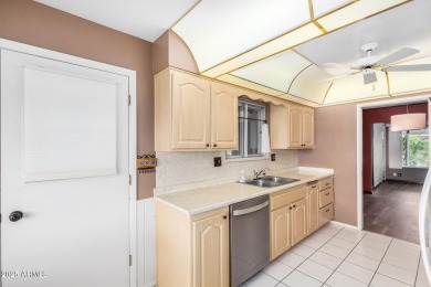Step into this lovingly cared-for 2-bedroom, 2-bathroom home in on Sun City Lakes West and East in Arizona - for sale on GolfHomes.com, golf home, golf lot