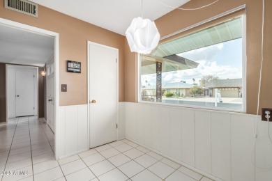 Step into this lovingly cared-for 2-bedroom, 2-bathroom home in on Sun City Lakes West and East in Arizona - for sale on GolfHomes.com, golf home, golf lot