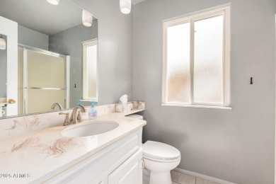 Step into this lovingly cared-for 2-bedroom, 2-bathroom home in on Sun City Lakes West and East in Arizona - for sale on GolfHomes.com, golf home, golf lot