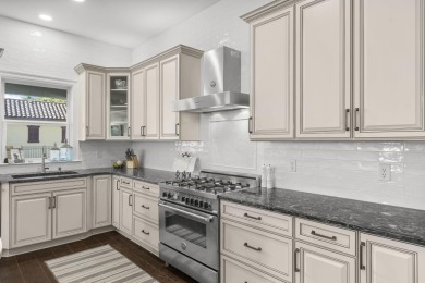 Welcome to this beautifully remodeled and redecorated two-story on Emerald Bay Golf Club in Florida - for sale on GolfHomes.com, golf home, golf lot