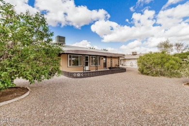 Step into this lovingly cared-for 2-bedroom, 2-bathroom home in on Sun City Lakes West and East in Arizona - for sale on GolfHomes.com, golf home, golf lot