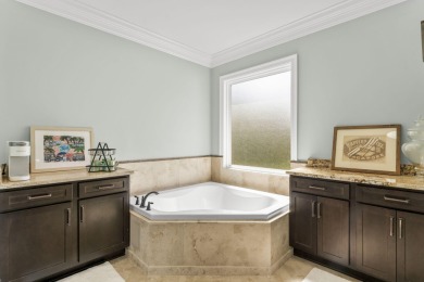 Welcome to this beautifully remodeled and redecorated two-story on Emerald Bay Golf Club in Florida - for sale on GolfHomes.com, golf home, golf lot