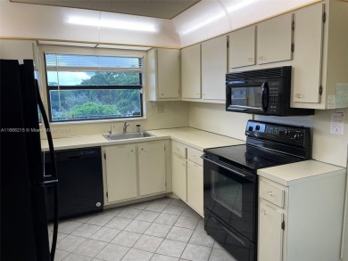 BEAUTIFULLY MAINTAINED 2 BED/2 BATH CONDO LOCATED IN THE SERENE on Sunrise Lakes Phase IV Golf Course in Florida - for sale on GolfHomes.com, golf home, golf lot