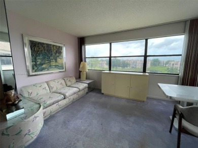 BEAUTIFULLY MAINTAINED 2 BED/2 BATH CONDO LOCATED IN THE SERENE on Sunrise Lakes Phase IV Golf Course in Florida - for sale on GolfHomes.com, golf home, golf lot
