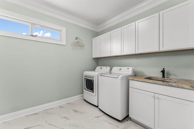 Welcome to this beautifully remodeled and redecorated two-story on Emerald Bay Golf Club in Florida - for sale on GolfHomes.com, golf home, golf lot