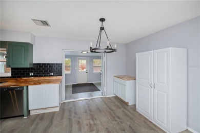 BEAUTIFULLY UPDATED CORNER LOT CHARMER with MAJOR UPDATES! on Oyster Creek Golf Club in Florida - for sale on GolfHomes.com, golf home, golf lot