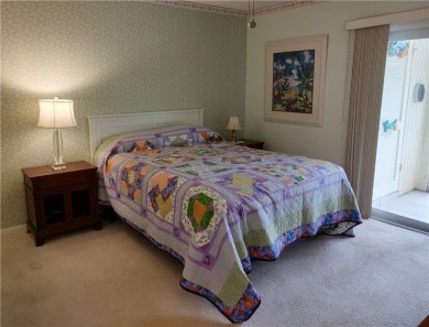 Resort style living here in beautifully remodeled 1st floor home on The American Golf Club in Florida - for sale on GolfHomes.com, golf home, golf lot