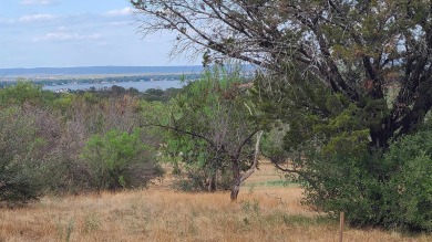Beautiful Lake LBJ and hill country views make this lot extra on Ram Rock Golf Course in Texas - for sale on GolfHomes.com, golf home, golf lot