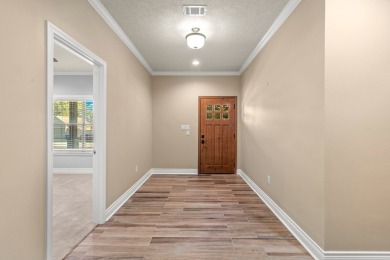 Welcome to 135 Brushwood--a custom-built retreat at Lake Sam on Rayburn Country Club in Texas - for sale on GolfHomes.com, golf home, golf lot