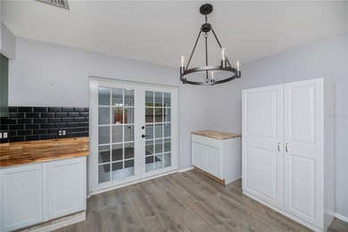 BEAUTIFULLY UPDATED CORNER LOT CHARMER with MAJOR UPDATES! on Oyster Creek Golf Club in Florida - for sale on GolfHomes.com, golf home, golf lot