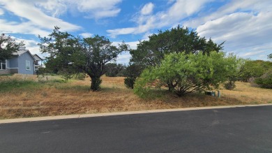 Beautiful Lake LBJ and hill country views make this lot extra on Ram Rock Golf Course in Texas - for sale on GolfHomes.com, golf home, golf lot