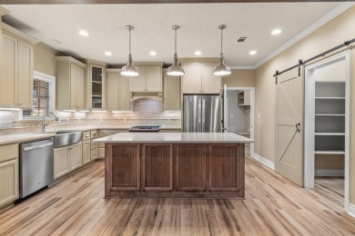 Welcome to 135 Brushwood--a custom-built retreat at Lake Sam on Rayburn Country Club in Texas - for sale on GolfHomes.com, golf home, golf lot
