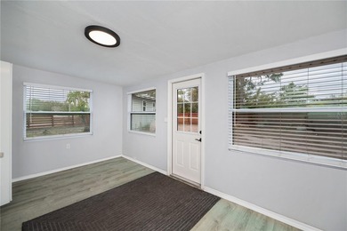 BEAUTIFULLY UPDATED CORNER LOT CHARMER with MAJOR UPDATES! on Oyster Creek Golf Club in Florida - for sale on GolfHomes.com, golf home, golf lot