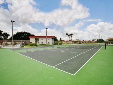 Resort style living here in beautifully remodeled 1st floor home on The American Golf Club in Florida - for sale on GolfHomes.com, golf home, golf lot