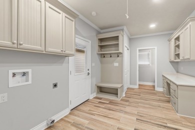 Welcome to 135 Brushwood--a custom-built retreat at Lake Sam on Rayburn Country Club in Texas - for sale on GolfHomes.com, golf home, golf lot