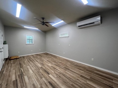Welcome to 135 Brushwood--a custom-built retreat at Lake Sam on Rayburn Country Club in Texas - for sale on GolfHomes.com, golf home, golf lot