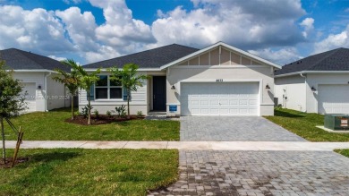 New lakefront gem with high-impact windows and a $5k seller on PGA Golf Club in PGA Village in Florida - for sale on GolfHomes.com, golf home, golf lot