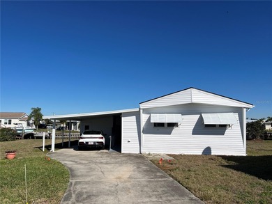 Affordable Saltwater Canal Waterfront Living with 40ft seawall on Mangrove Bay Golf Course in Florida - for sale on GolfHomes.com, golf home, golf lot