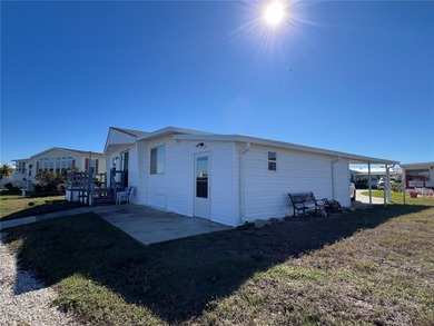 Affordable Saltwater Canal Waterfront Living with 40ft seawall on Mangrove Bay Golf Course in Florida - for sale on GolfHomes.com, golf home, golf lot