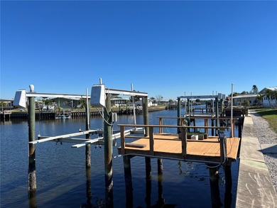 Affordable Saltwater Canal Waterfront Living with 40ft seawall on Mangrove Bay Golf Course in Florida - for sale on GolfHomes.com, golf home, golf lot