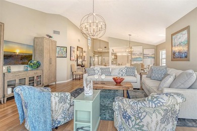 Privately tucked away within the private Winding Oaks community on Longboat Key Golf Club Resort in Florida - for sale on GolfHomes.com, golf home, golf lot