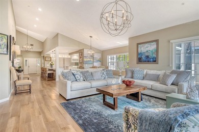 Privately tucked away within the private Winding Oaks community on Longboat Key Golf Club Resort in Florida - for sale on GolfHomes.com, golf home, golf lot