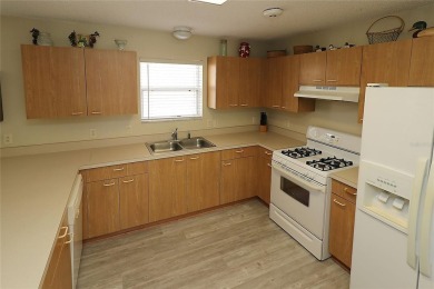 This 2/2 Marathon Courtyard villa is located in the Villas on Glenview Championship Golf and Country Club in Florida - for sale on GolfHomes.com, golf home, golf lot