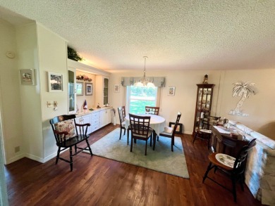 Move right into this furnished two-bedroom, two-bath home on Pine Lakes Country Club in Florida - for sale on GolfHomes.com, golf home, golf lot