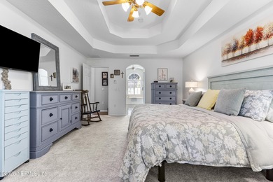 Discover the Palencia lifestyle in this beautifully maintained on The Palencia Club in Florida - for sale on GolfHomes.com, golf home, golf lot