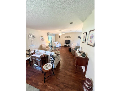 Move right into this furnished two-bedroom, two-bath home on Pine Lakes Country Club in Florida - for sale on GolfHomes.com, golf home, golf lot