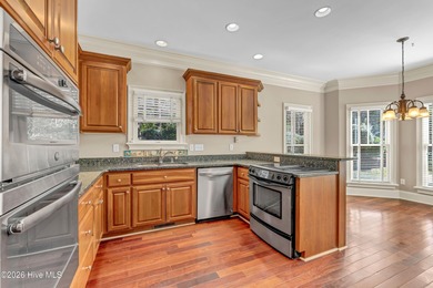 Grand home on the #6 hole of the Jack Nicklaus golf course in on Country Club of Landfall in North Carolina - for sale on GolfHomes.com, golf home, golf lot