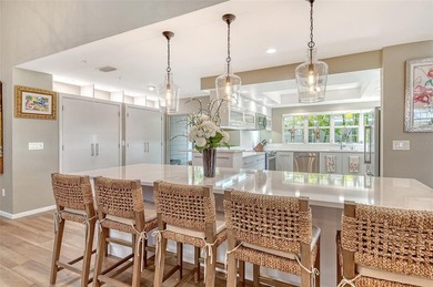 Privately tucked away within the private Winding Oaks community on Longboat Key Golf Club Resort in Florida - for sale on GolfHomes.com, golf home, golf lot