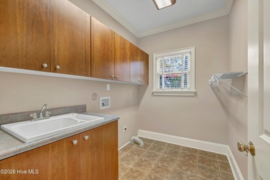 Grand home on the #6 hole of the Jack Nicklaus golf course in on Country Club of Landfall in North Carolina - for sale on GolfHomes.com, golf home, golf lot