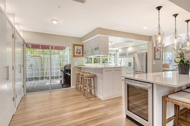 Privately tucked away within the private Winding Oaks community on Longboat Key Golf Club Resort in Florida - for sale on GolfHomes.com, golf home, golf lot