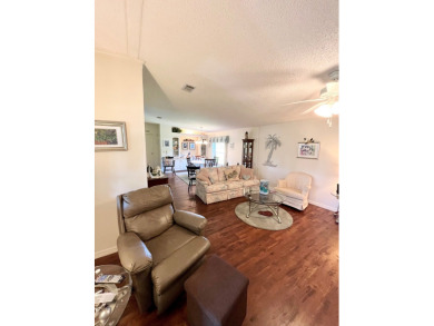 Move right into this furnished two-bedroom, two-bath home on Pine Lakes Country Club in Florida - for sale on GolfHomes.com, golf home, golf lot