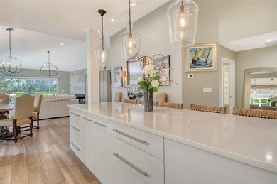 Privately tucked away within the private Winding Oaks community on Longboat Key Golf Club Resort in Florida - for sale on GolfHomes.com, golf home, golf lot