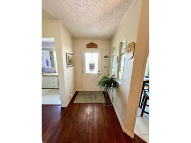 Move right into this furnished two-bedroom, two-bath home on Pine Lakes Country Club in Florida - for sale on GolfHomes.com, golf home, golf lot